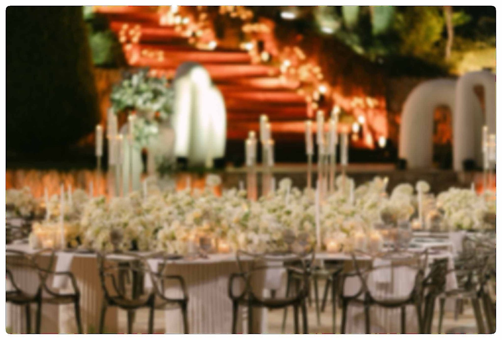 Aerial view of the reception beneath a canopy of columns and string lights