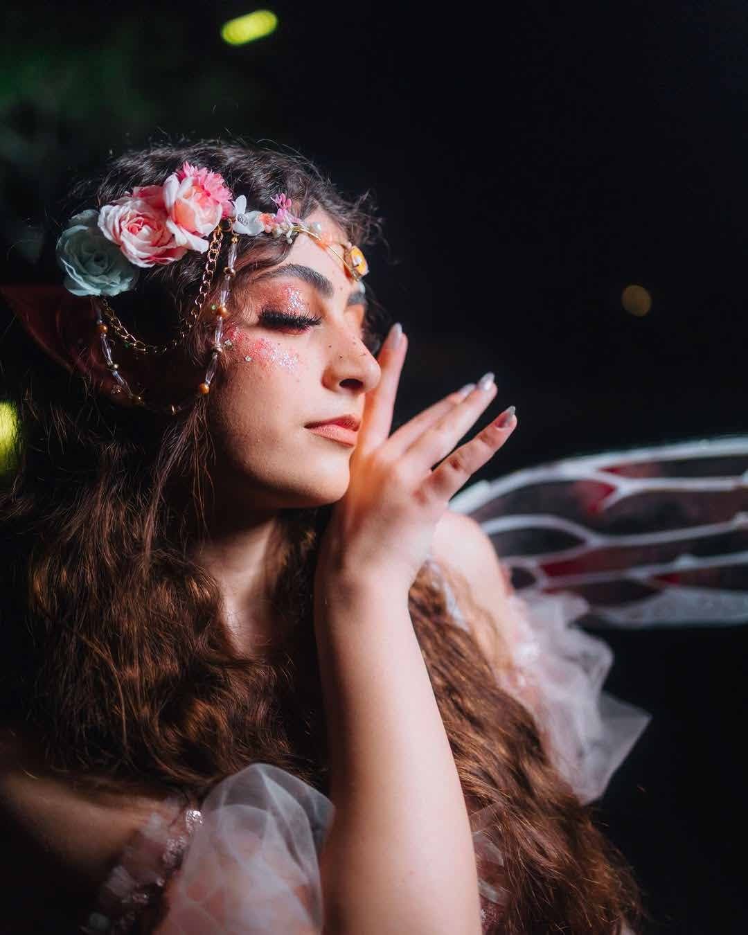 Close portrait of fairy makeup and glitter styling