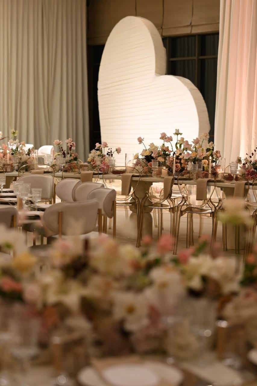 Second detail of blush florals and candlelight