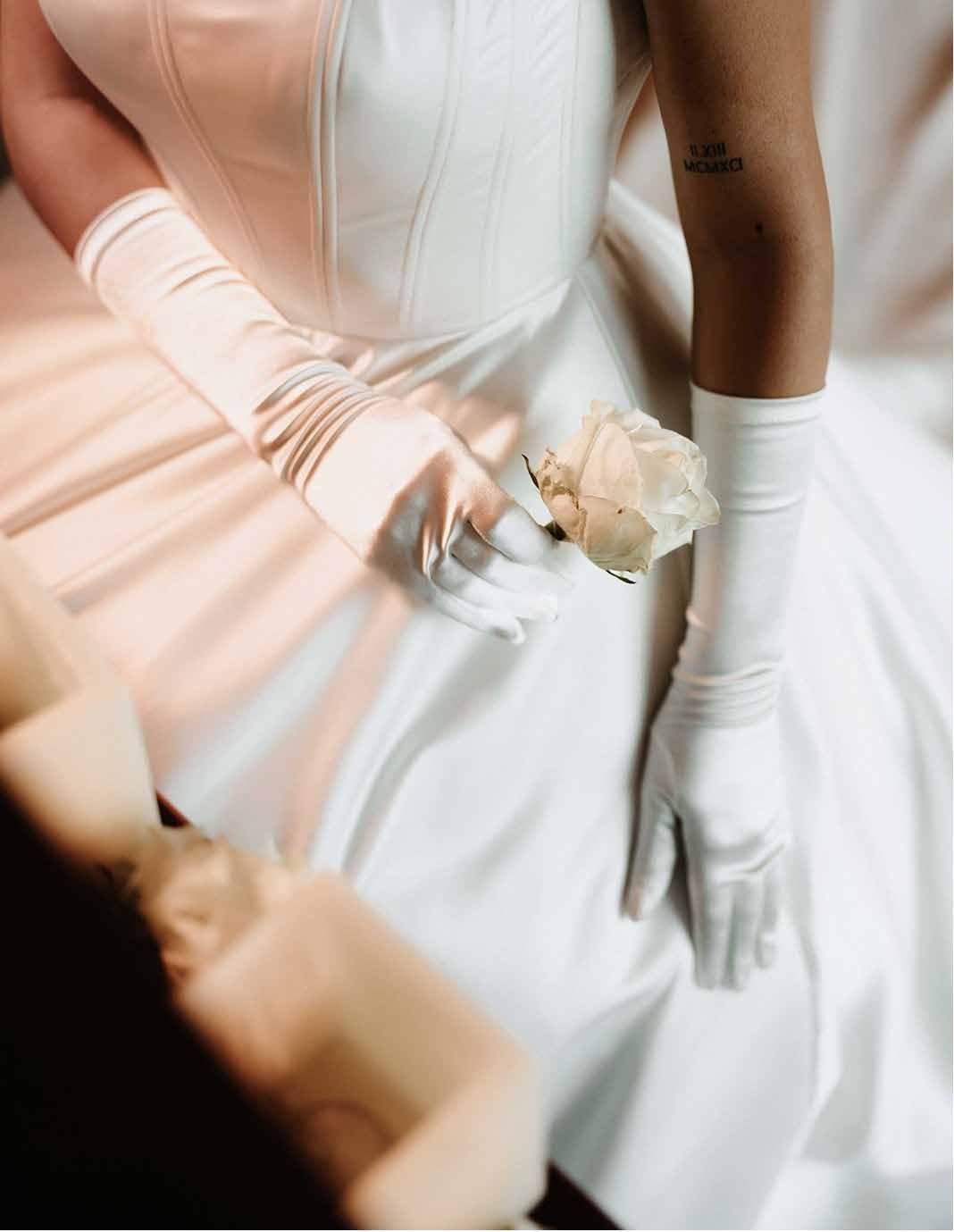 Motion-blur detail of the bridal bouquet in warm light
